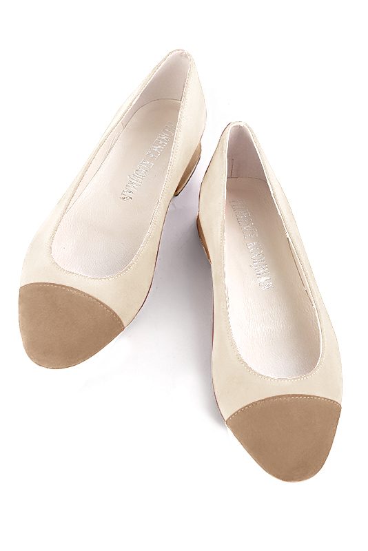 Tan flat store pumps